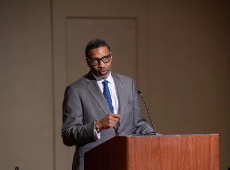 NAACP President and CEO Derrick Johnson speaking at an event.