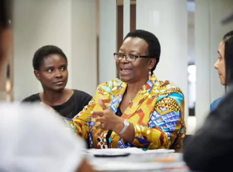 Black Female Speaking in Meeting