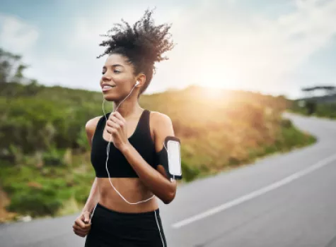 Young Black Female Athlete Outside on a Run