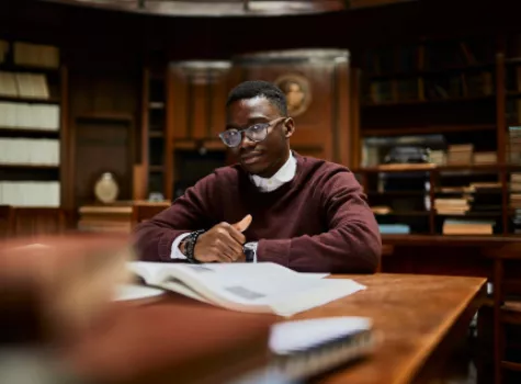 Young Black Student in Library