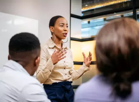 Black Female Leading Presentation in Meeting