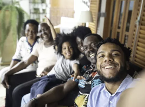 Happy Black Family Taking a Selfie Together Outside