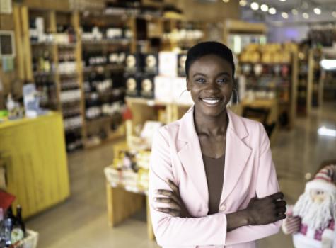 Smiling Black Woman Inside Store