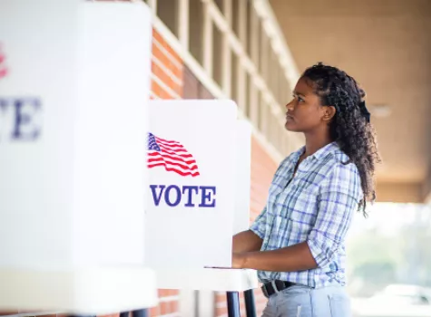 Young Black Female at Voting Booth