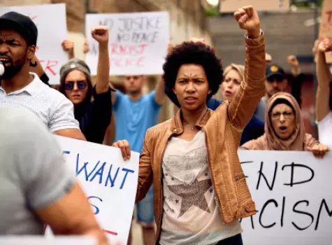 Black Female in Protest with Raised Fist