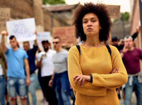 Young Black Female Standing Proudly in a Protest