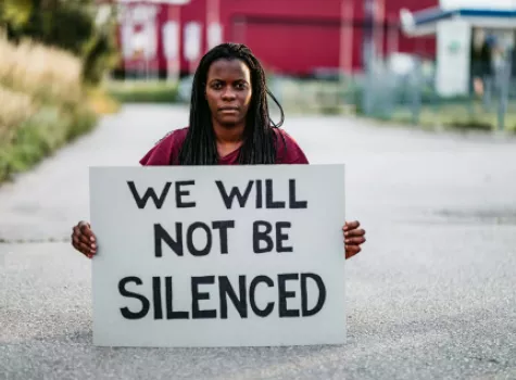 Black Female - Solo - with Sign "We Will Not Be Silenced"