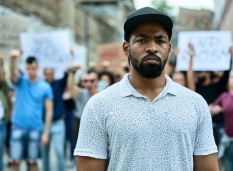 Black Man Standing in Solidarity with Protesters