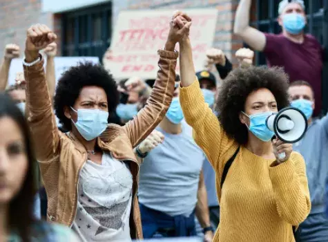 Black Females with Hands Locked in Protest