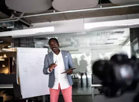 Black Businessman Giving a Presentation