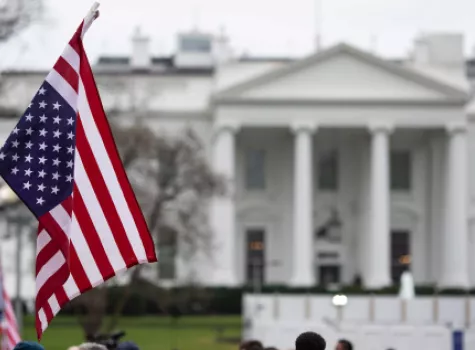 American Flag Hanging Outside of the White House