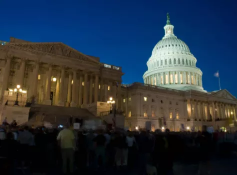 The U.S. Capitol Building at Night - Crowd of People Outside
