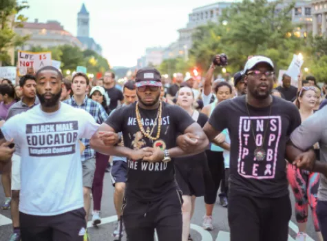 Black Men Locking Arms in Protest