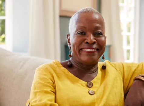 Close-up - Black Female - Solo - Smiling on Couch
