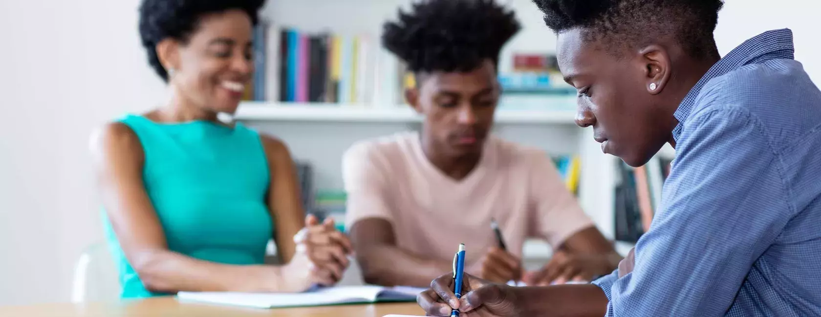 Black Students Doing Work at Desk