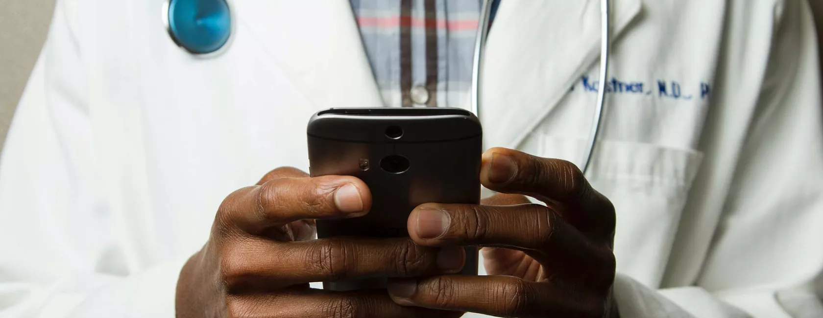 Close-up - Black Male Hands - Doctor - Holding Cell Phone